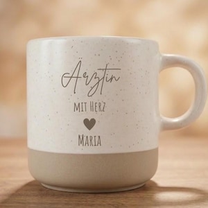 Stoneware mug with heart design, featuring a doctor, engraved with a name of your choice.