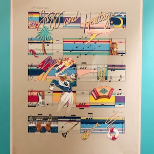 May include: A 1984 New Orleans Jazz and Heritage Festival poster featuring musical staff lines, a figure holding a colorful parasol, and various instruments including a saxophone, accordion, and trumpet against a light tan background.