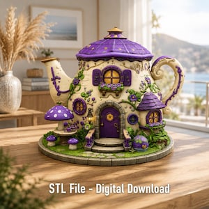 May include: A teapot-shaped house figurine featuring a purple roof, a central purple door, and multiple windows. The exterior is decorated with green vines, small purple flowers, and a mushroom-shaped table set on a circular stone base. Text reads: STL File - Digital Download.