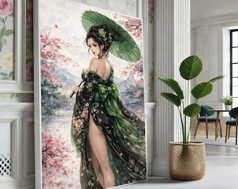 May include: A framed canvas art print depicts a woman in a green and black floral kimono, holding a green parasol. The artwork features a serene landscape with cherry blossoms and a body of water. The woman has dark hair and is looking over her shoulder.