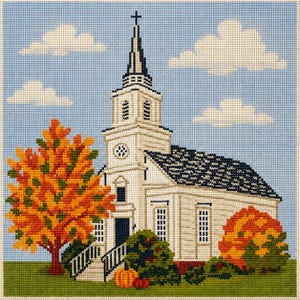 May include: A cross-stitch embroidery pattern depicting a white church with a tall steeple and dark roof, set against a light blue sky with white clouds. Autumn trees with orange and yellow leaves, green grass, and orange pumpkins surround the building.