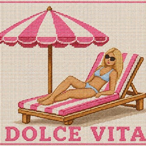 May include: A cross-stitch pattern featuring a person with blonde hair wearing sunglasses and a light blue bikini, reclining on a pink and white striped lounge chair under a matching pink and white striped beach umbrella, with the text DOLCE VITA.