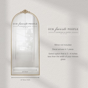 May include: A gold-framed mirror decal with the text "OUR favorite PEOPLE" above "COURTNEY & DAVID 01.13.26". The decal is 50.8 cm wide and designed for a 61 cm mirror. The mirror is not included.