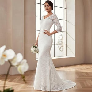 white long prom dresses with sleeves Tulle Puffy Dress Sweet 16 Gowns Designed with long sleeves and intricate jewel appliques Long Sleeve White Prom Dress