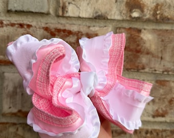 Fiocco per capelli rosa con volant bianchi