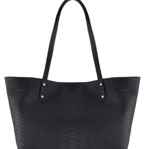 May include: Black tote bag with a snakeskin texture. The bag has two long handles and is made of a durable material. The bag has a wide opening and is suitable for carrying various items. The handles are attached with silver rivets.