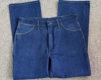Pantalones vaqueros Wrangler vintage para hombre, talla 36x30, lavado medio, de mezclilla azul, corte recto regular.