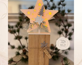 Könnte beinhalten: Ein dekorativer Sternaufsatz mit gelben Sternen und einem grauen Tannenbaum auf hellorangem Karohintergrund, montiert auf einem rechteckigen Holzblock. Der Block ist mit einer grauen Schneeflocke, Kordel und einem kleinen Holzanhänger mit Text verziert.