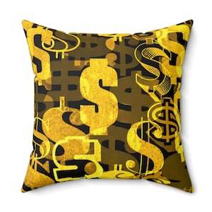 May include: Square cushion featuring a repeating pattern of gold dollar symbols on a brown and black backdrop. The cushion has a soft, textured look, with dollar symbols of varying sizes and styles, creating a dynamic design.