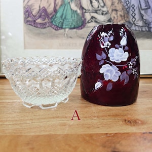 Side view of fairy lamp A with clear glass base and red glass shade separated