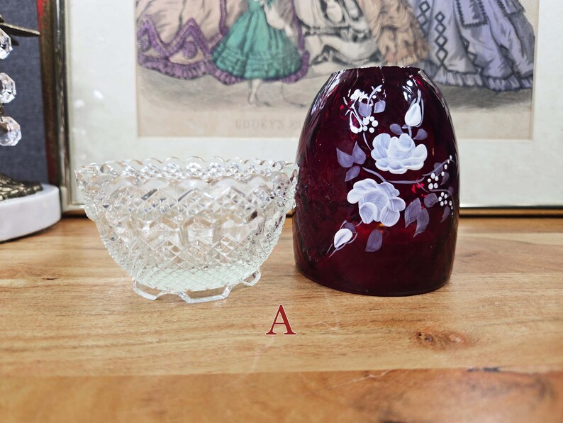 Side view of fairy lamp A with clear glass base and red glass shade separated
