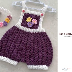 May include: A handmade purple crochet baby romper with white trim and straps, adorned with colorful flower appliques. The romper is displayed on a white hanger. The text "Tane Baby Romper Crochet Pattern" is visible.
