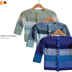 May include: Three Jerry Baby Cardigan knit pattern examples displayed on wooden hangers. Each long-sleeved cardigan features a button-front closure, a round neckline with decorative eyelet detailing, and horizontal stripes in varying shades of green, grey, and blue.