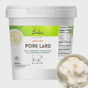 May include: A white container of Sulu Nutrition 100% Pure Pork Lard. The container has a green and white label with the text "Pork Lard" and a drawing of a pig. The net weight is 1.8 kg. A small bowl of lard is in the foreground.