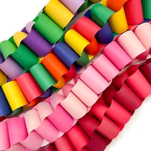 May include: A set of three ceramic mugs with a speckled, matte finish. The mugs are in shades of cream, light gray, and dark gray. Each mug has a simple, minimalist design, perfect for coffee or tea.