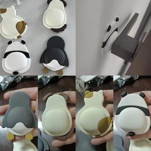 Op de afbeelding: Een verzameling dierlijk gevormde kastdeurbumpers. De bumpers hebben ontwerpen van een kat, hond, panda en pinguïn. De bumpers zijn in verschillende kleuren, waaronder wit, zwart, bruin en grijs. Ze zijn gemaakt van een zacht materiaal.