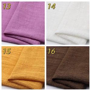May include: A collection of four fabric swatches labeled 13, 14, 15, and 16. Swatch 13 is purple, 14 is white, 15 is mustard yellow, and 16 is dark brown. Each piece of fabric features a visible woven texture with a grid-like pattern.