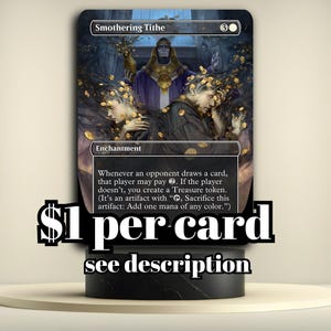 May include: A Magic: The Gathering card titled "Smothering Tithe" featuring an illustration of figures with gold coins. The card is an enchantment with text describing its function. The card is displayed on a black stand.