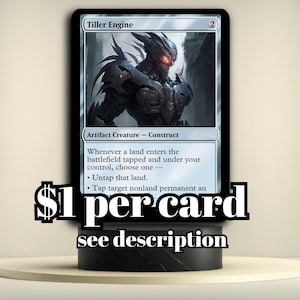 May include: A Magic: The Gathering card titled "Tiller Engine" featuring a detailed illustration of a robotic construct with red eyes. The card is displayed on a black stand with text that says "see description".