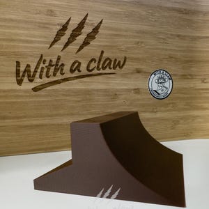 May include: A rustic wooden sign with the text "Welcome to our home" in white lettering. The sign features a distressed finish and a simple, inviting design, perfect for front door decor.