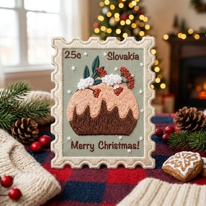 May include: A rectangular embroidered patch shaped like a postage stamp on a sage green background. It features a brown Christmas pudding with white icing, red berries, and green leaves. Text reads 25c, Slovakia, and Merry Christmas.