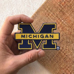 Vintage Michigan College Style Embroidered Iron-On Patch – Retro Mascot Inspired Sports Fan Patch for Jacket Hat Backpack
