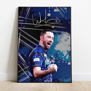 May include: Framed art print depicting a man in a blue patterned shirt, set against a blue and grey abstract backdrop. The print includes a signature. The artwork is displayed on a wooden floor.