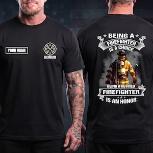 May include: A black short-sleeved t-shirt featuring a front graphic with a firefighter emblem and a customizable name box. The back displays a firefighter in gear holding an American flag with the text Being a Firefighter is a Choice, Being a Retired Firefighter is an Honor.