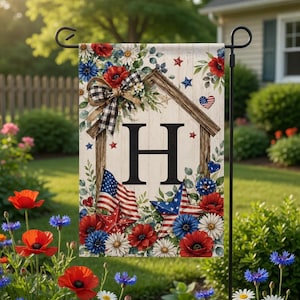 May include: A garden flag featuring a wooden house frame with the letter "H" in black. The flag is decorated with red, white, and blue floral and star designs, and a gingham bow. American flag and star accents complete the patriotic theme.