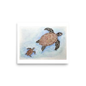 May include: Watercolour print showing two sea turtles in a light blue ocean. The larger turtle has a brown shell with a geometric pattern, and black and white flippers. A smaller turtle swims nearby.