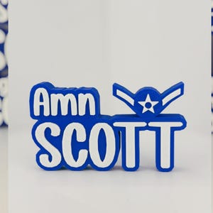 May include: A rustic wooden sign with the text "Welcome to our home" in white lettering. The sign features a distressed finish and a simple, inviting design, perfect for front door decor.