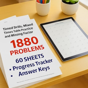 May include: A stack of white paper sheets with the text "Timed Drills, Mixed Times Table Practice and Missing Factor" and "1880 PROBLEMS". A digital tablet and a small succulent plant sit on a wooden surface. Coloured pencils are in a white cup.