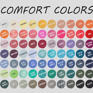 May include: A color chart titled COMFORT COLORS featuring a grid of circular swatches in various shades including white, yellow, orange, pink, red, purple, blue, green, brown, grey, and black, each labeled with its specific color name.