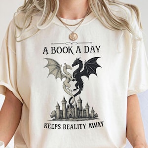 A Book A Day Keeps Reality Away Shirt, Book Lover Shirt, Fantasy Reader Tee, Dragon Book Shirt, Bookish Gift, Reader Aesthetic Shirt