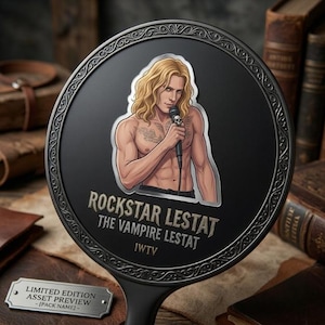May include: A round black mirror featuring a graphic of a shirtless blonde person with long hair holding a microphone. The text reads ROCKSTAR LESTAT THE VAMPIRE LESTAT IWTV. A small metal plaque below reads LIMITED EDITION ASSET PREVIEW - PACK NAME.