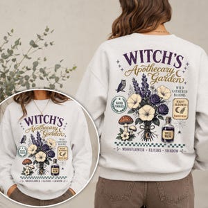 Retro Halloween sublimation design mockup featuring Witch's Apothecary Garden artwork on a stylish unisex sweatshirt with floral bouquet, botanical clipart, vintage typography, and cozy fall aesthetic.