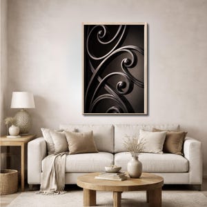 May include: A framed sepia-toned print featuring an abstract design of swirling, metallic scrollwork. The artwork is displayed above a white sofa with neutral-toned throw pillows, creating a cozy living room setting.
