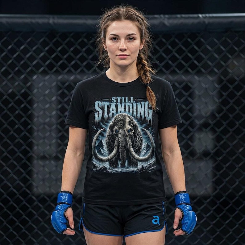Still Standing Shirt, Woolly Mammoth Tee, Prehistoric Survival, Ice Blue Animal Graphic, Dark Winter Nature, Resilience Gift, Reaper Reps image 3