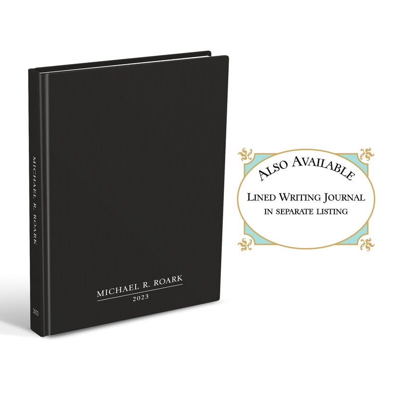 May include: A black hardcover book with the name MICHAEL R. ROARK and the year 2023 printed in white on the front cover and spine. A separate graphic element displays the text ALSO AVAILABLE LINED WRITING JOURNAL IN SEPARATE LISTING.