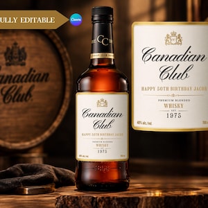 May include: A glass bottle of Canadian Club whisky with a custom cream-colored label featuring the text Happy 50th Birthday Jacob, Premium Blended Whisky, Est. 1975, 40% alc./vol., and 700 ml. The bottle has a black cap and a dark amber liquid inside.