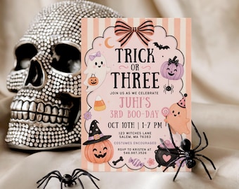 May include: A rectangular party invitation card with a light pink and white striped background, featuring a large bow at the top and the text Trick or Three. The design includes illustrations of ghosts, pumpkins, a cauldron, and candy, with event details for Juhi's 3rd Boo-Day on Oct 10th.