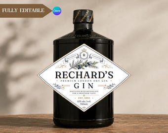 Op de afbeelding: Een donkerbruine glazen fles gin met een ruitvormig wit etiket. Het etiket bevat de tekst RECHARD'S PREMIUM LONDON DRY GIN, botanische illustraties, een kroonpictogram en de specificaties 43% alc./vol. en 700ml.