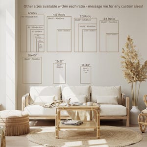 May include: A light and airy living room with a sofa, coffee table, and rug. The wall features print size guides, including A sizes, 4:5, 2:3, and 3:4 ratios, with measurements in cm. Text on the wall says "Other sizes available within each ratio - message me for any custom sizes!"