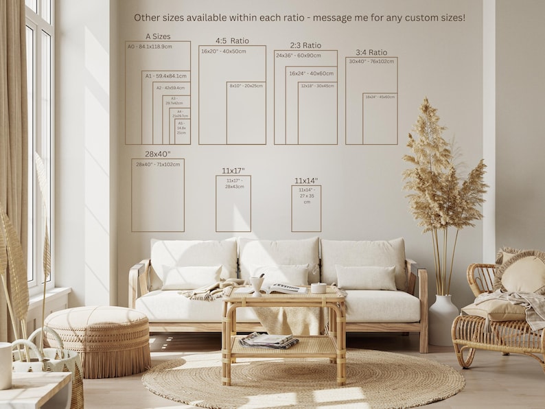 May include: A light and airy living room with a sofa, coffee table, and rug. The wall features print size guides, including A sizes, 4:5, 2:3, and 3:4 ratios, with measurements in cm. Text on the wall says "Other sizes available within each ratio - message me for any custom sizes!"