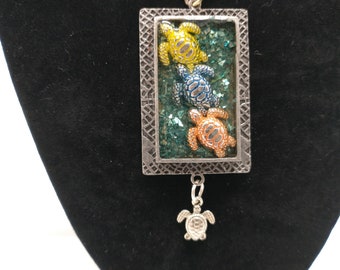 Turtles in Resin Pendant