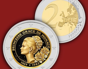May include: A commemorative two-euro coin featuring a profile portrait of Princess Grace of Monaco on a black background with gold roses. The text reads "PRINCESSE GRACE DE MONACO" along with the years "1929" and "1982". The outer ring is silver.