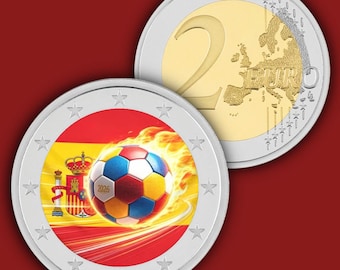 May include: A two-euro coin featuring a colourful football with the text 2026, set against the Spanish flag with flames. The coin has a silver outer ring with stars and a gold inner circle showing a map of Europe and the word EURO.