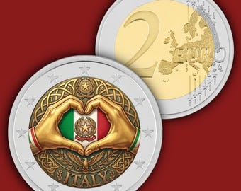 May include: A two-euro coin featuring a bimetallic design with a gold-coloured centre and silver-coloured outer ring. The reverse shows a map of Europe and the number 2. The obverse displays two hands forming a heart over the Italian flag and emblem.