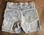 Levi 39 s shorts, child distressed jeans, size 6 6x kids, gender neutral, back to school, light wash denim, Levi strauss, ripped cut shorts