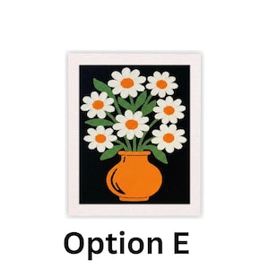 May include: A framed artwork featuring a vase of daisies. The orange vase holds white daisies with orange centers and green leaves against a black background. The artwork is framed in a white border, with the text "Option E" at the bottom.